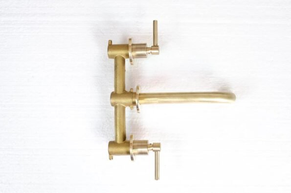 Brushed brass wall mounted bathroom vessel sink faucet with simple lever handles - Image 3