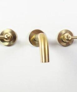Brushed brass wall mounted bathroom vessel sink faucet with simple lever handles
