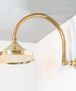 Handcrafted unlacquered brass shower system