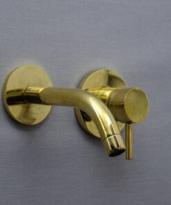 single handle unlacquered brass wall faucet hot and cold water