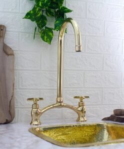 Arched V bridge unlacquered brass kitchen faucet